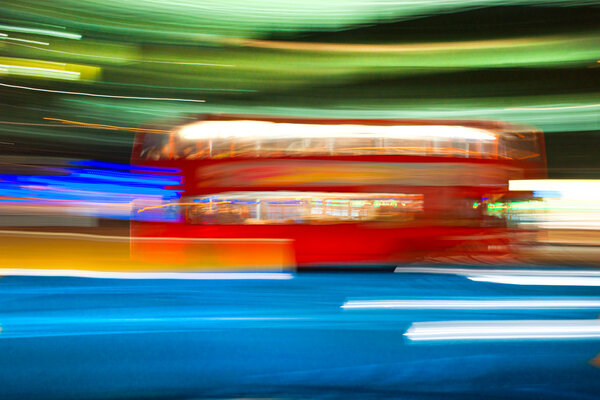 Blurred movie of a double-decker bus, London, Uk
.