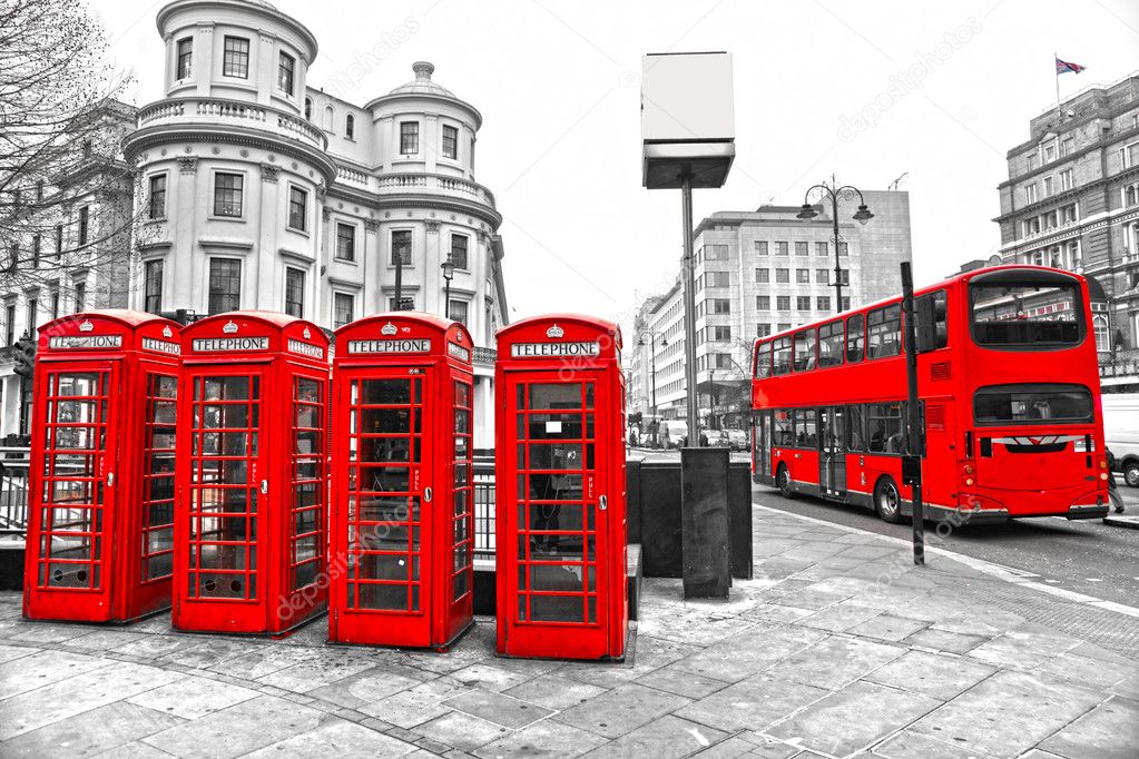 LONDON - MARCH 17: Double-decker bus, red telephone boxes and underground logo. The London 'Underground' logo will be used for other transportation systems - has bee