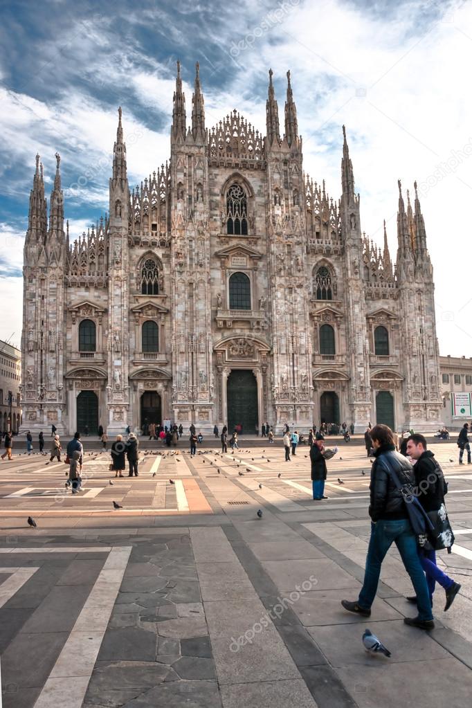 MILAN - DECEMBER 11: Tourists at Piazza Duomo on December 11, 20