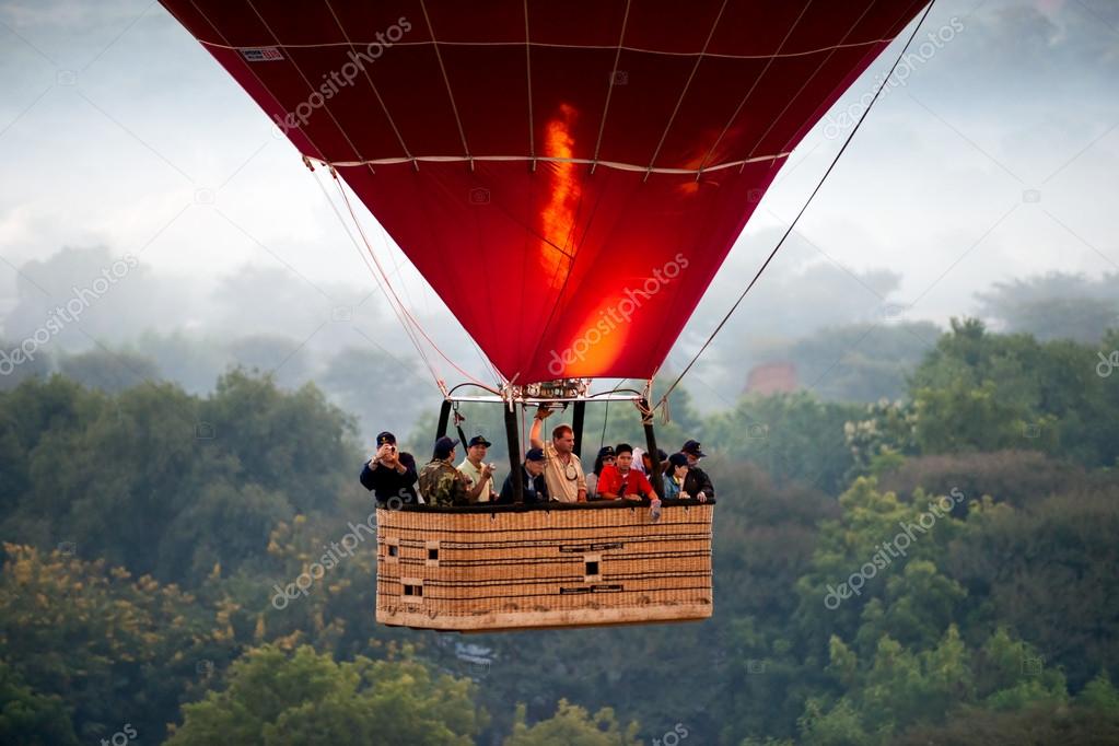 BAGAN - NOVEMBER 29,: Tourist in an Hot Air Balloon over the pla