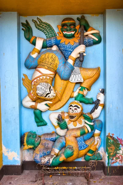 Ramayana scene carved on a wall of a temple in Vientiane, Laos. — Stock Photo, Image