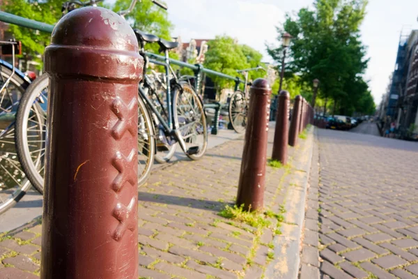 Amsterdam, xxx street Pillar and bike. — Stock Photo, Image