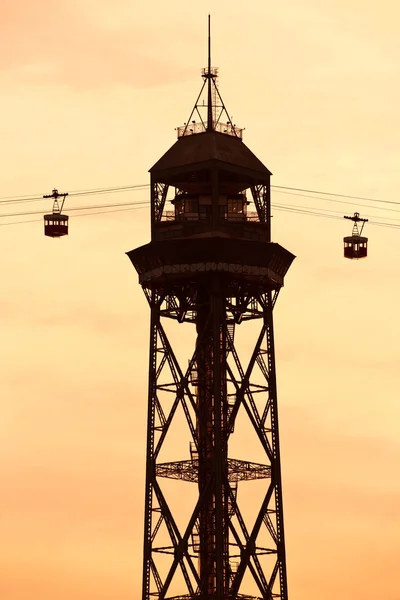 A silhouette of two air-cable cabins against sky — Stock Photo, Image