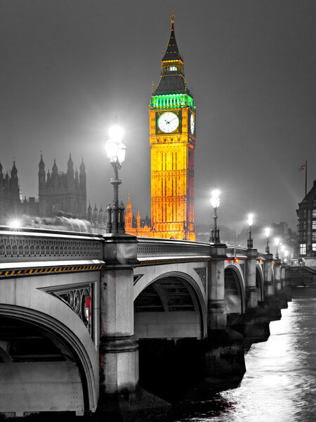 The Big Ben, the House of Parliament and the Westminster Bridge at night, London, UK.