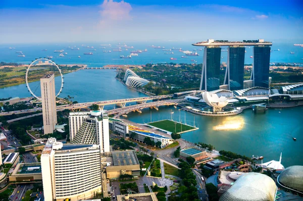 Singapore stad skyline vid solnedgången. Stockbild