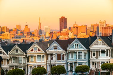 The Painted Ladies of San Francisco, California sit glowing amid clipart