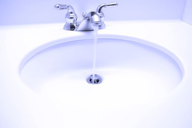 Bathroom Sink with Water Running clipart