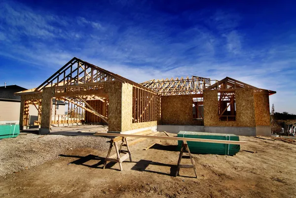 Construction of New Home in Development Royalty Free Stock Photos