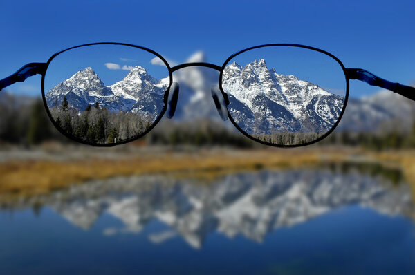 Glasses and Clear Vision of Mountains