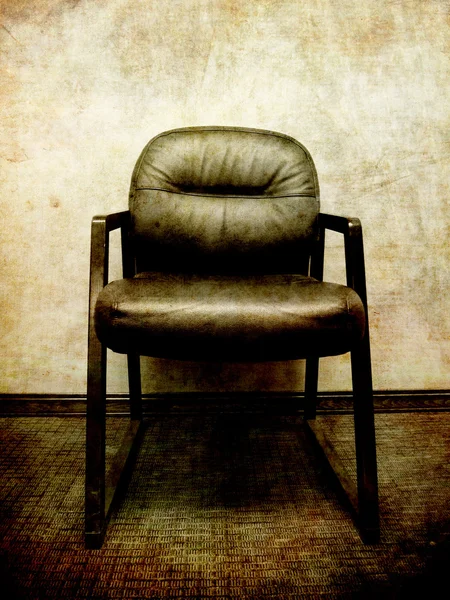 Black Office Chair with Textured Wall — Stock Photo, Image