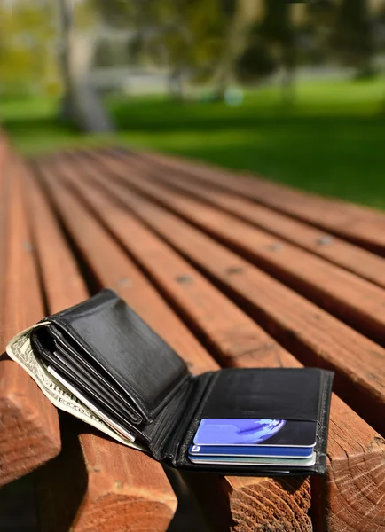 Wallet Lost and Left on Bench with Cash — Stock Photo, Image