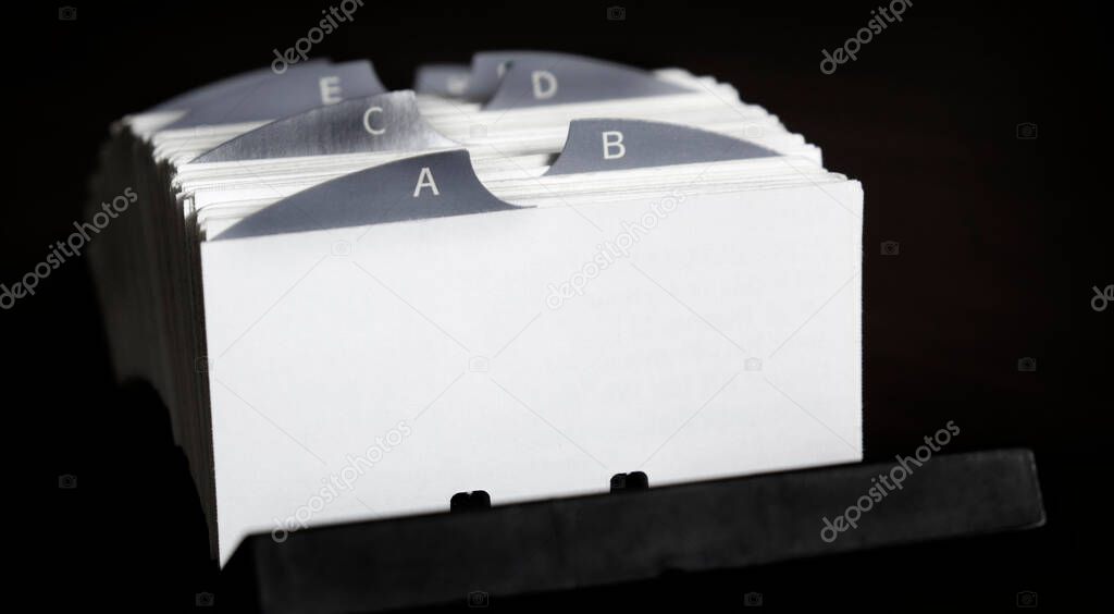 Index cards for buisness contacts and communication contact people organized tabs