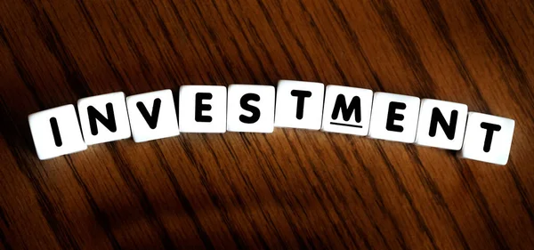 Investment Wealth Spelled Letters Blocks Dice Representing Savings Planning Future — Stock Photo, Image