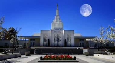 Idaho Falls LDS Mormon Latter Day Saint Temple with Blue Sky Religion Religious Worship with bull moon