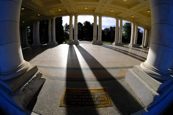 Columns of marble on a building pavilion showing architecture design and decorative structure with light and shadows