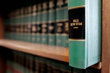 Lawbooks on shelf title for study legal knowledge Wills and Estates