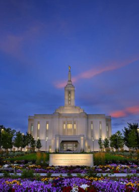 Pocatello Idaho LDS Mormon Latter-day Saint Temple with sky clouds flowers and trees