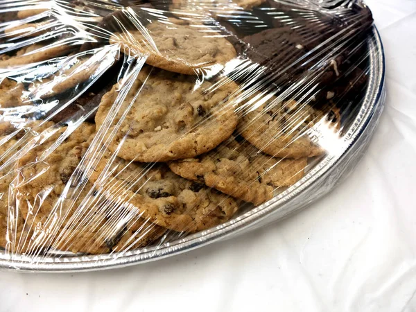 Many Cookies Plate Plastic Wrap Fresh Dessert — Stock Photo, Image