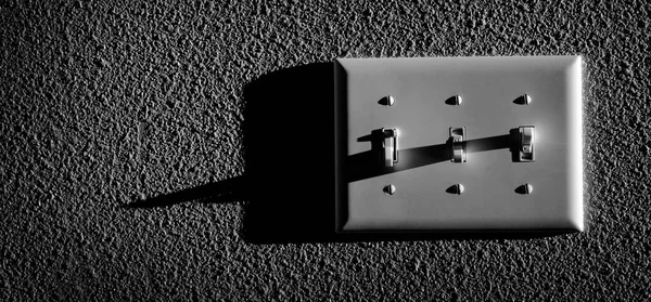 Closeup of light switch for turning on power to lamps