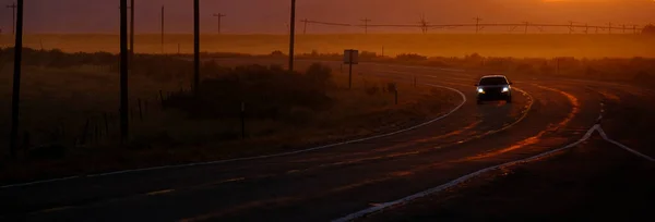 Car Driving Road Roadwar Sunset Sunrise Power Poles Silhouette — Stock Photo, Image