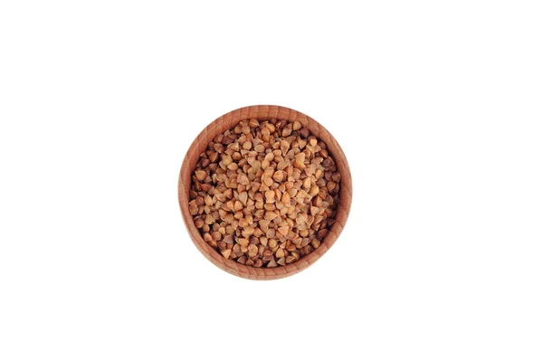 Buckwheat in the wooden bowl — Stock Photo, Image