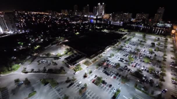 Aerial at night over the city lights — Stock Video