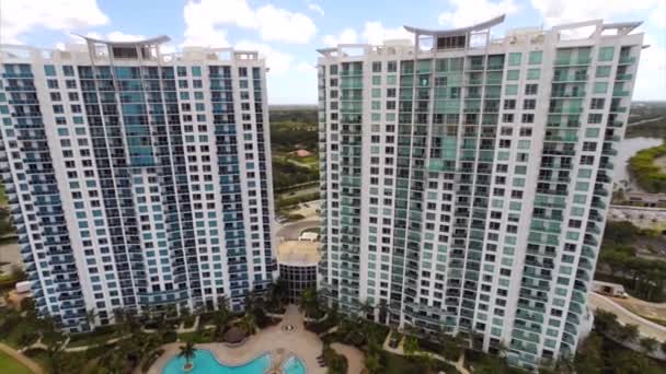 Aerial highrise condos on the lake — Stock Video