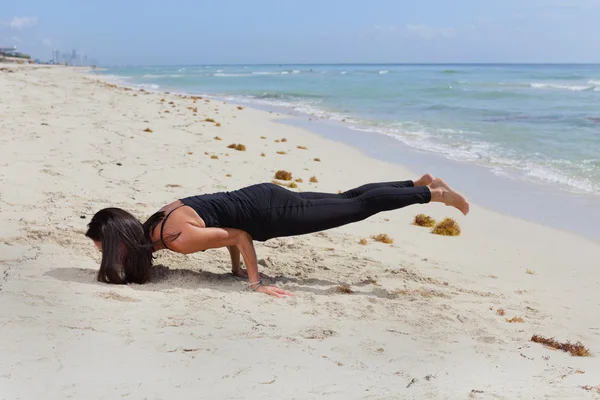 Yoga woman balancing on arms — Stok fotoğraf