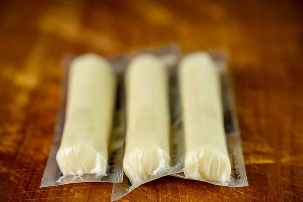 Individually Wrapped Cheese Stick Kids Snack — Stock Photo, Image