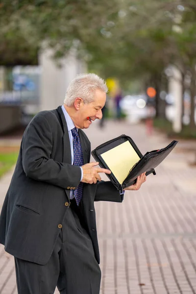 Businessman Fumbling His Notebook — Stock Photo, Image