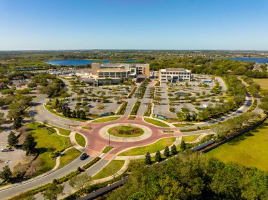 Winter Garden, FL, USA - February 20, 2022: Aerial photo of AdventHealth Winter Garden ER hospital medical center compound clipart