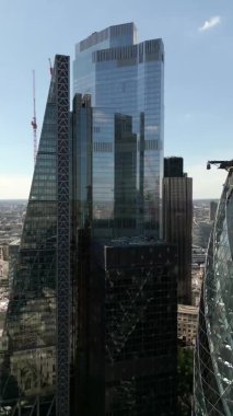 Aerial pull out shot skyscrapers of London 4k