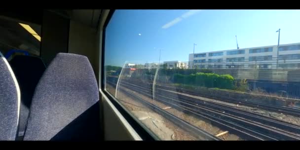 Train Departing Brighton Heading London — стоковое видео