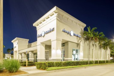 Stuart, FL, USA - August 6, 2022: Night photo Sleep Number bed store Stuart FL