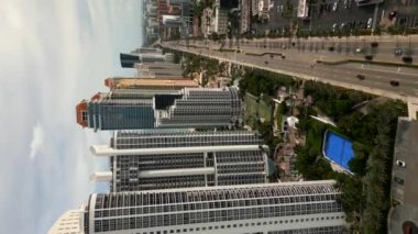 Vertial aerial drone video high-rise condominium Towers Sunny Isles Beach Florida