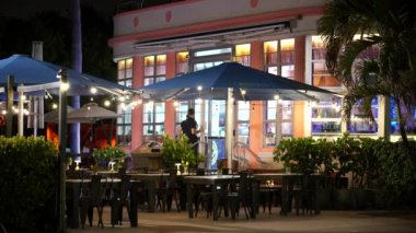 Miami Beach, FL, USA - August 31, 2022: 8k night Miami. Ronis by the Ocean