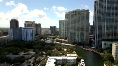 Aerial reveal The Las Olas Grand Condominium swimming pool deck on the New River Fort Lauderdale FL