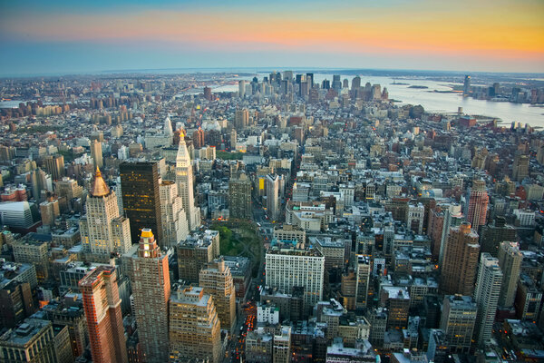 Aerial view over lower Manhattan, New York from Empire State building top at dusk
