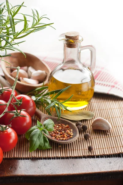 Bottle of olive with tomatoes — Stock Photo, Image