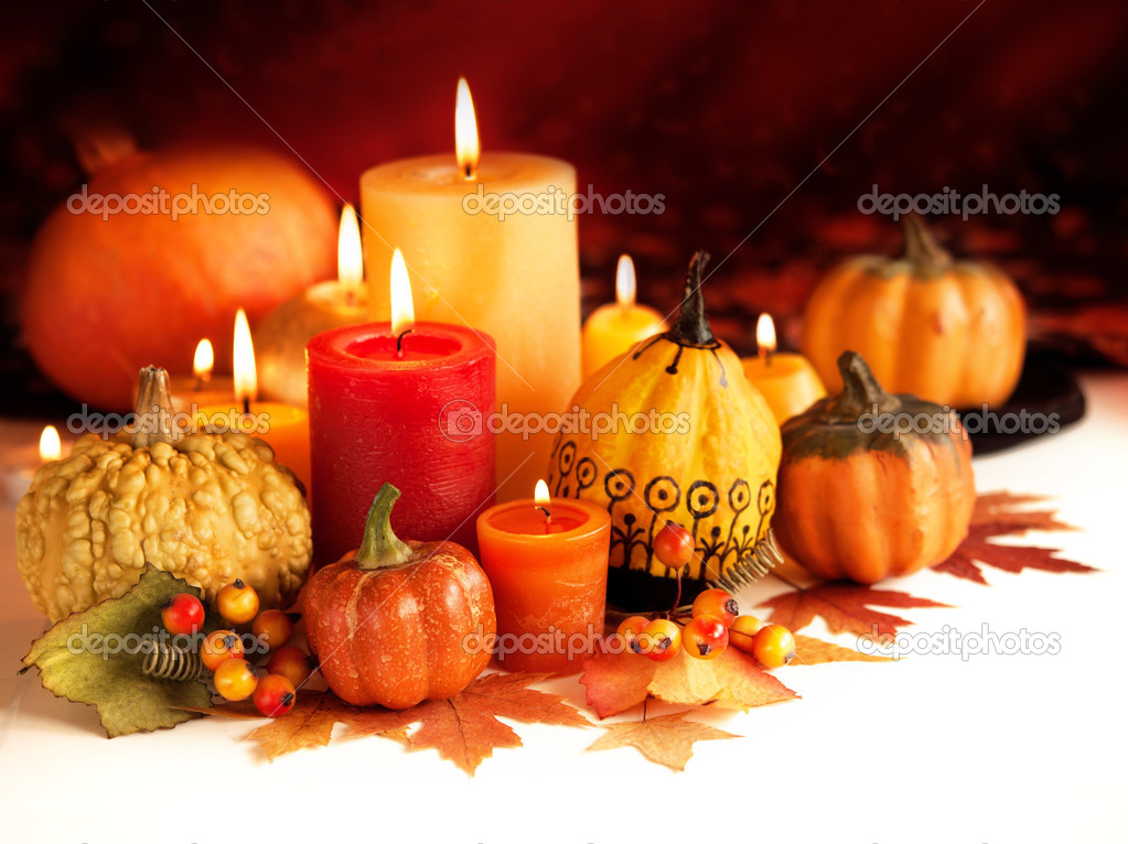 Candle and pumpkins
