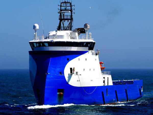 Offshore supply vessel underway to offshore installation.