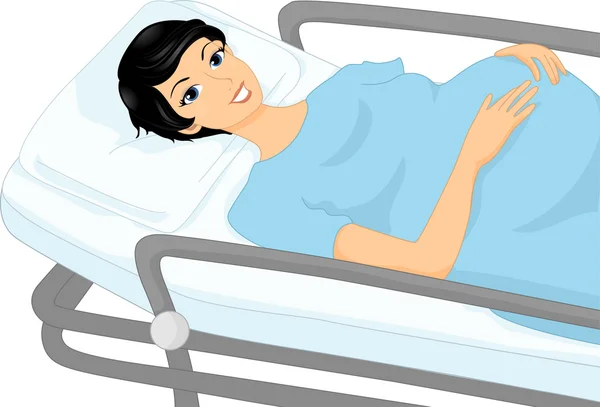 Gravid kvinna på en sjukhus-vagn — Stockfoto