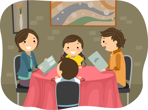 Family having a Dinner in a Restaurant — Stock Image Family having a Dinner in a Restaurant Royalty Free Stock Photos