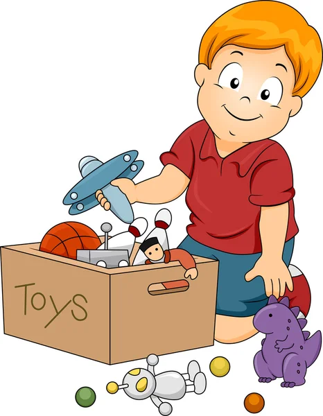 Kid boy lagra leksaker — Stockfoto