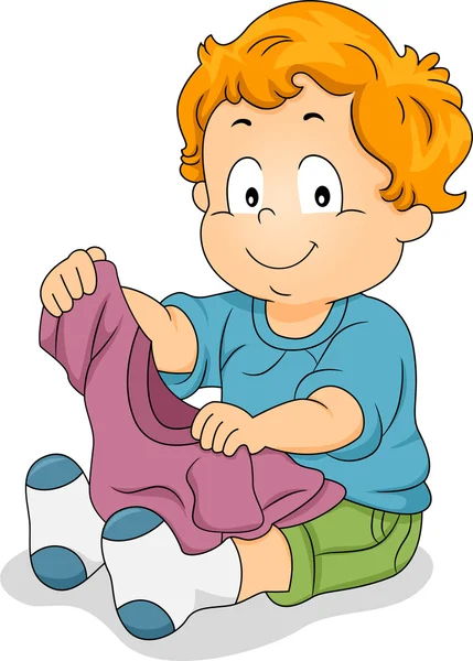 Toddler chłopiec trzyma t-shirt — Zdjęcie stockowe