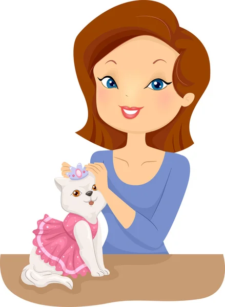 Kobieta ubieranie kotka w stroje cute — Zdjęcie stockowe