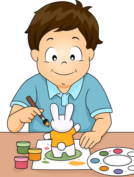 Figura niño pintando un conejo — Foto de Stock