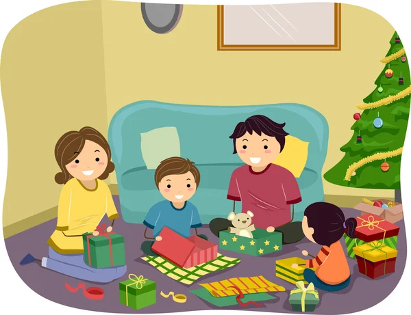 Família abrindo presentes de Natal — Fotografia de Stock