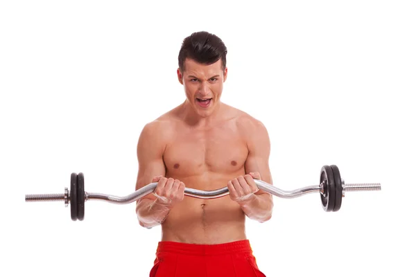 Krachtige gespierde man met een barbell in handen — Stockfoto