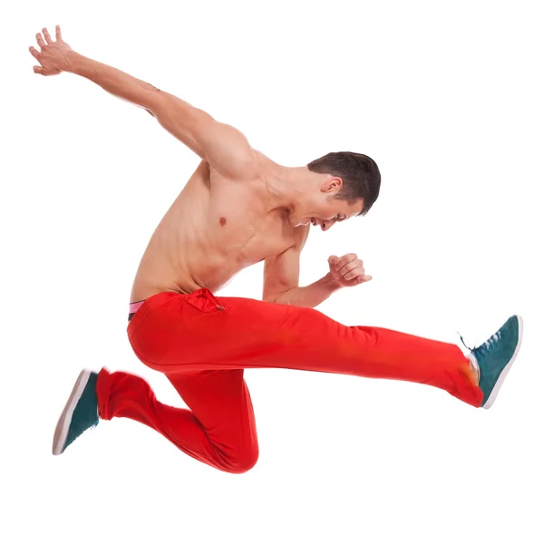 Cool looking dancer makes a difficult jump — Stock Photo, Image